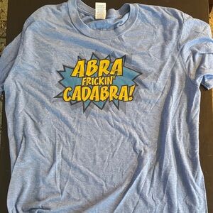 Abra Frickin Cadabra! Gildan Softstyle Sky Blue Tee with Navy Logo